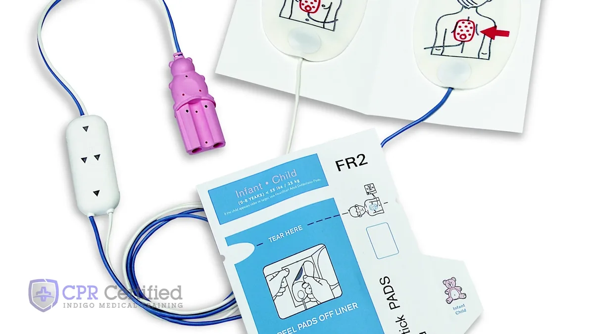 A set of pediatric AED pads with their placement diagram, showing where each pad goes on a small body.